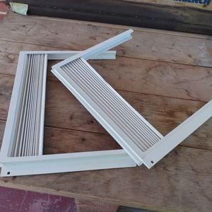 Window air conditioner side panels